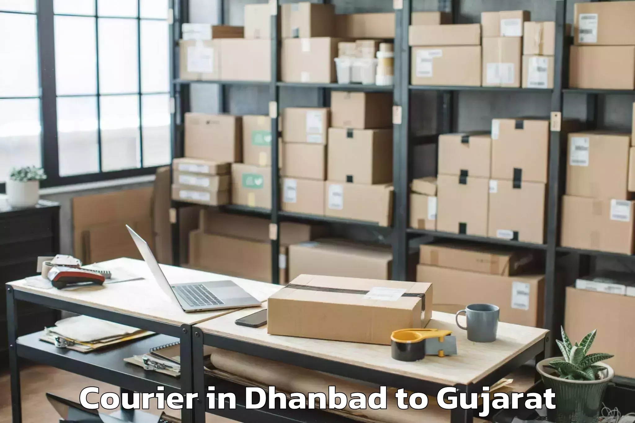 Reliable Dhanbad to Shree Somnath Sanskrit Univers Courier